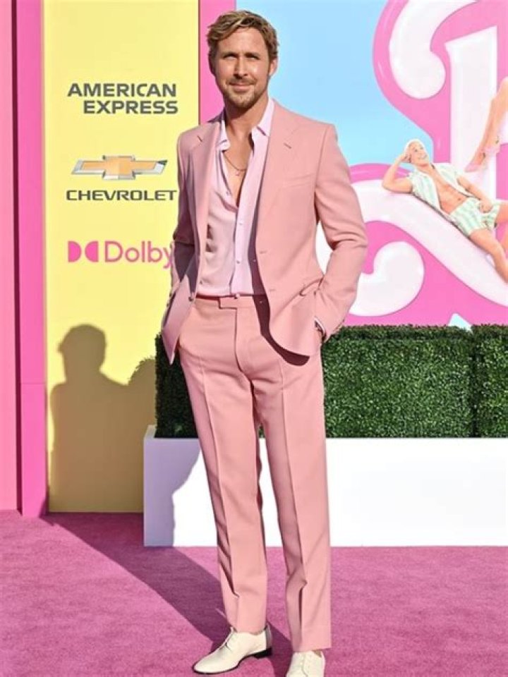 Reveal The Enigmatic Charm Of Sebastian Stan's Pink Suit: A Style Odyssey