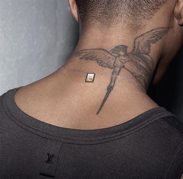 Unveiling The Enigmatic Symbolism Behind Pharrell's Neck Tattoo