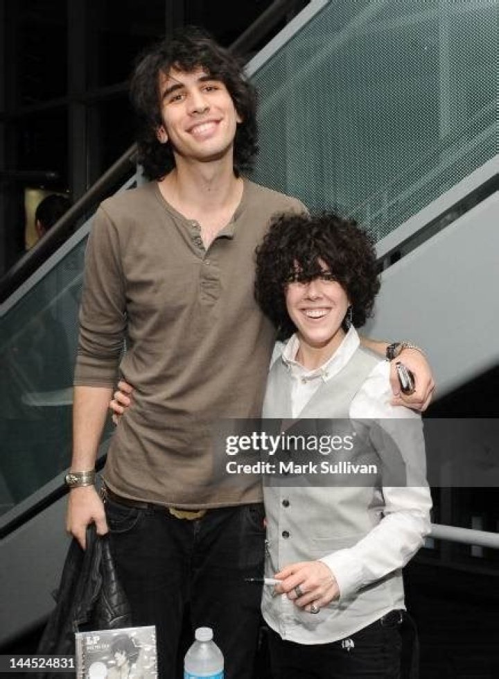 Unveiling The Parents Behind Laura Pergolizzi's Musical Journey